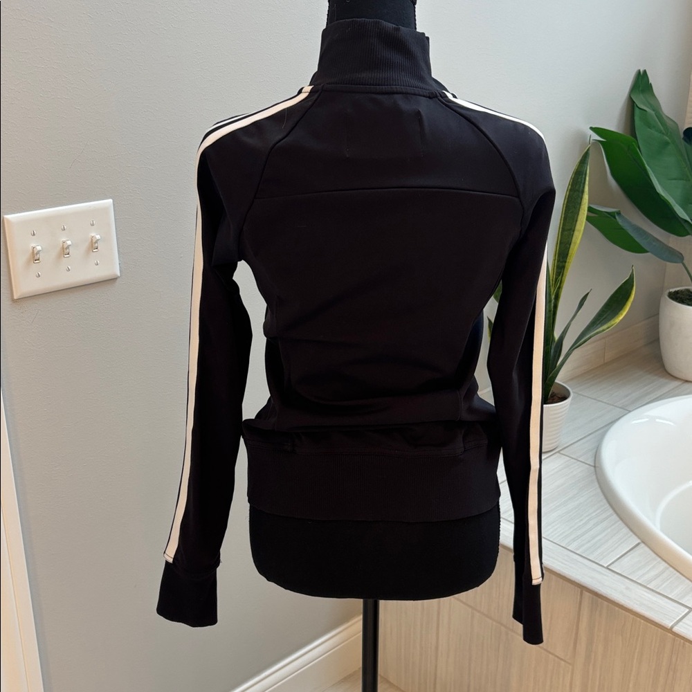 Athleta Black Track Jacket with White Stripes size XS in great condition.